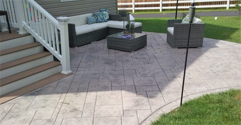 Photo of patio with stamped concrete design.
