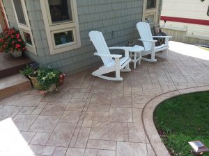 Photo of patio with stamped concrete design.