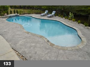 Photo of stamped concrete around a pool