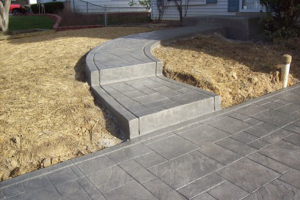 Photo of stamped concrete walkway designs.