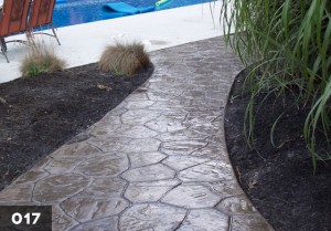 Photo of stamped concrete walkway designs.