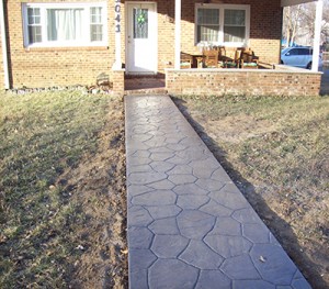 Photo of a stamped concrete walkway.