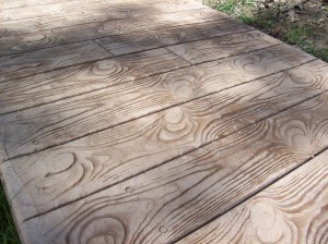 Photo of wood plank styled stamped concrete.