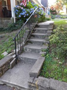 A before photo of a Catonsville property before getting a new stairs and sidewalk.